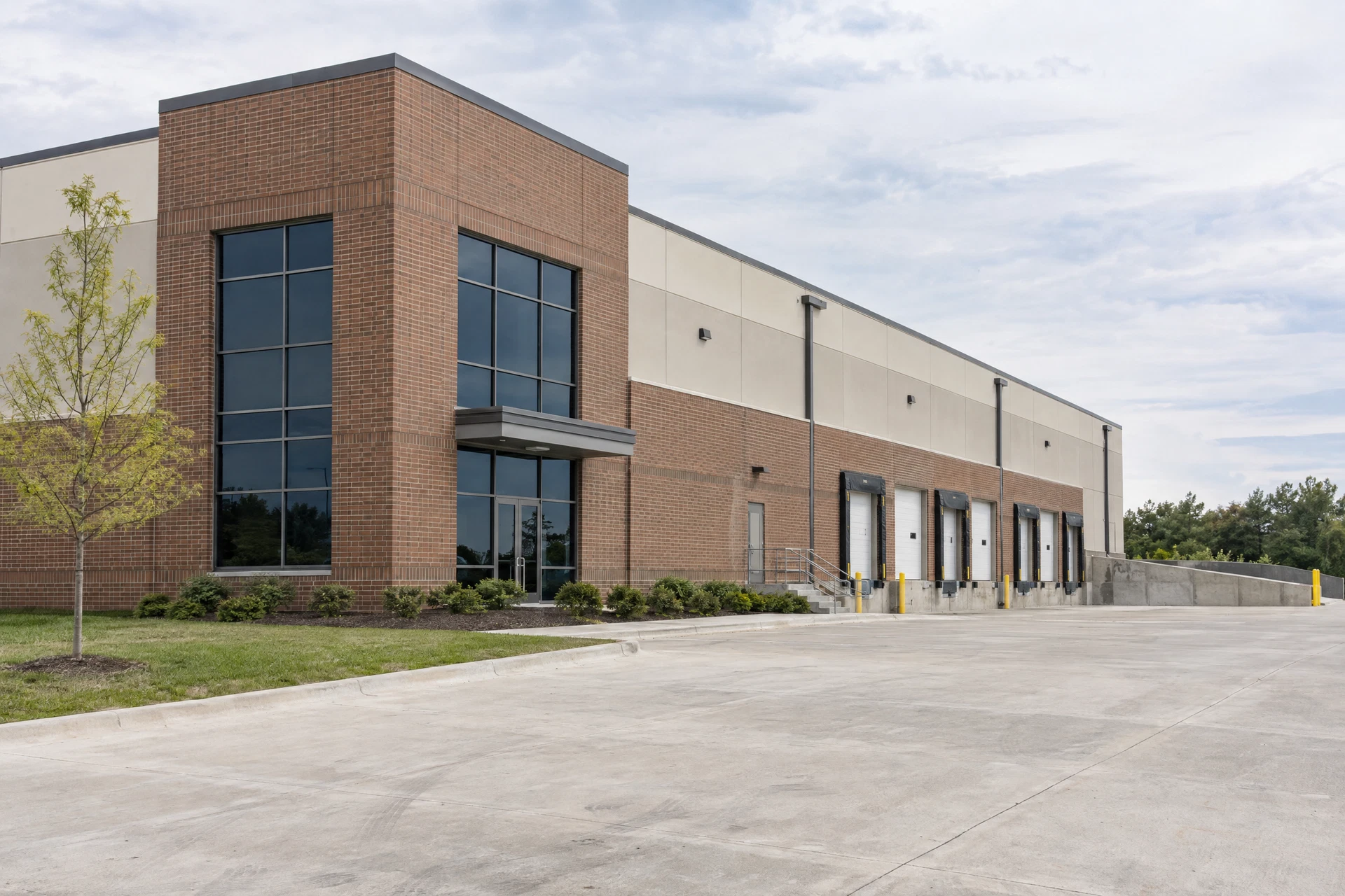 Illustrative Midwestern commercial property exterior with loading bays